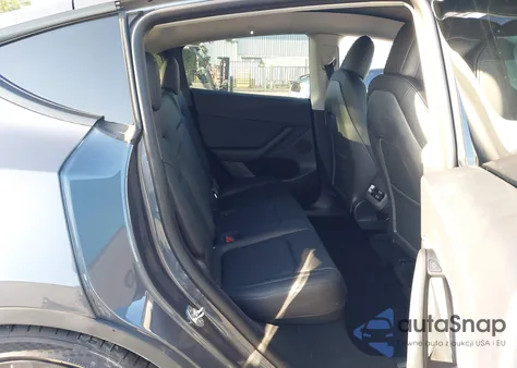 2023 Tesla Model Y Performance Dual Motor All-Wheel Drive z USA, uszkodzony, nr VIN 7SAYGDEF2PF634220